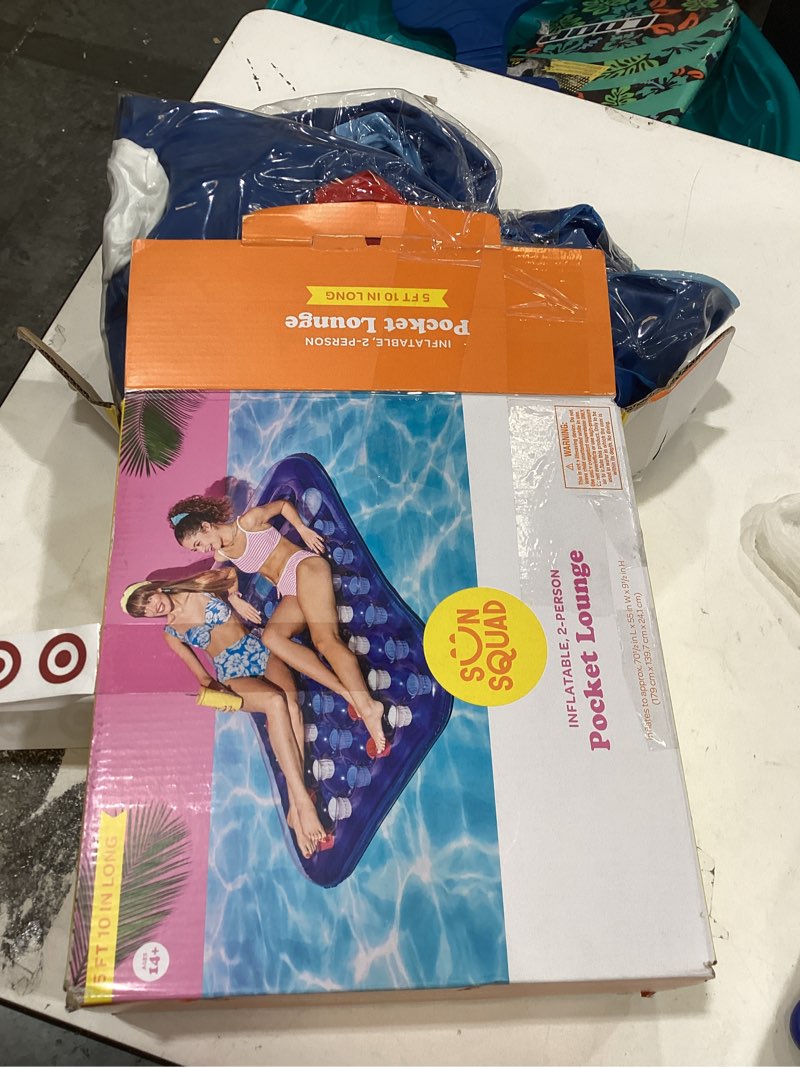 Condition photo showing As Is for deluxe pocket lounge novelty float - sun squad™ green