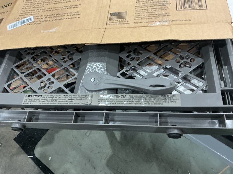 Condition photo showing Good Condition for mypet paws portable pet gate: 26-40" wide expandable, pressure mounted no tools needed, durable dog gate for doorways, made in usa, 23" tall, fieldstone gray