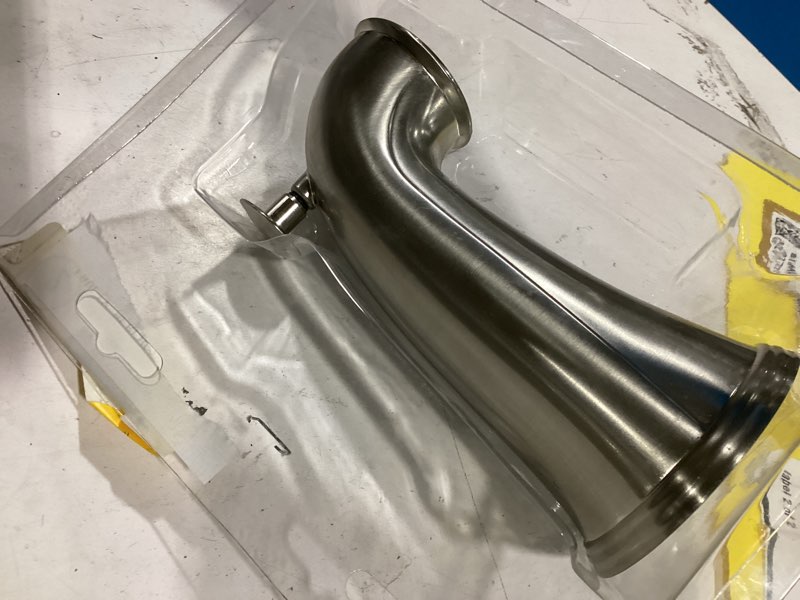Condition photo showing As Is for 5-1/2 in. decorative tub spout in brushed nickel