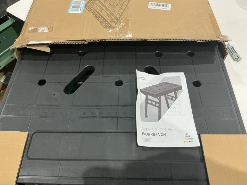 Condition photo showing Good Condition for 34 in. w x 24 in. d x 31 in. h black foldable work bench, portable heavy duty shed shelving table for garage