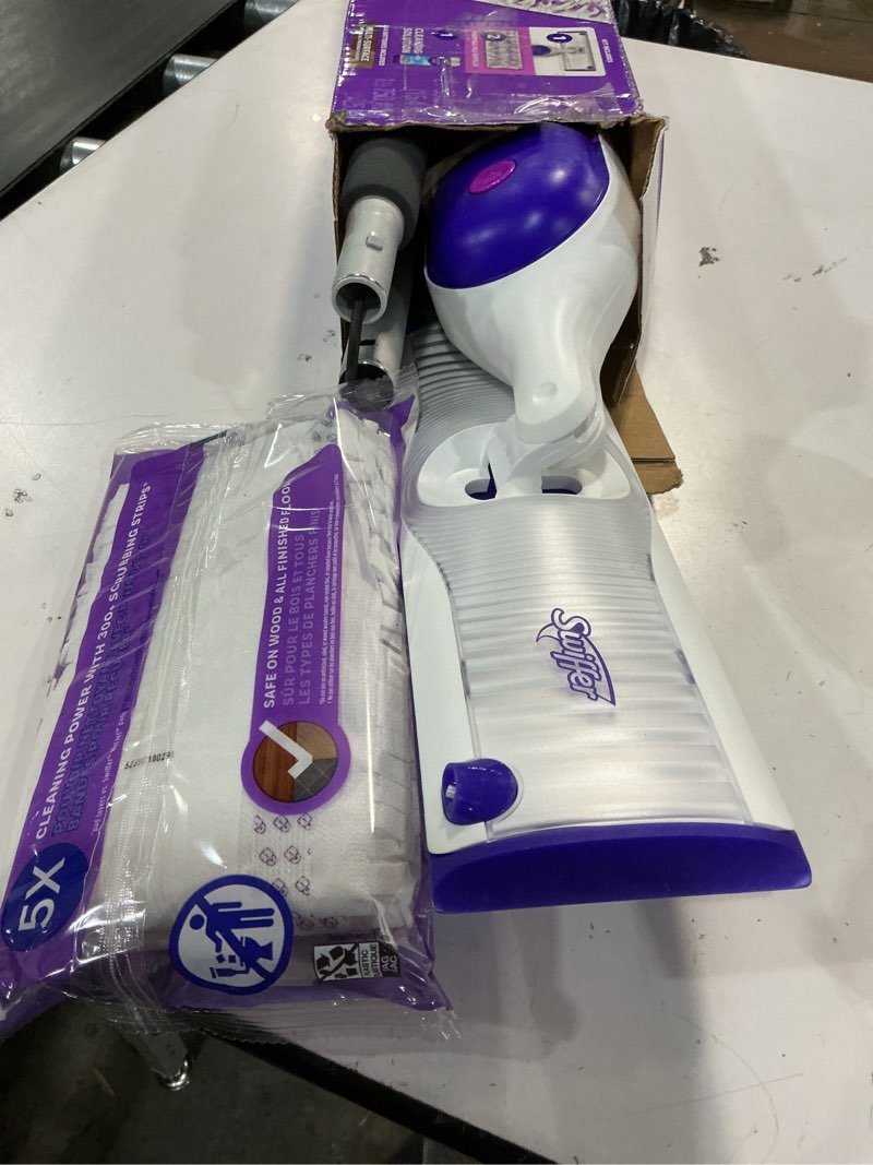 Condition photo showing Good Condition for swiffer powermop multi-surface mop kit for floor cleaning, includes powermop, 2 mopping pad refills, 1 cleaning solution with fresh scent and 2 batteries purple and white