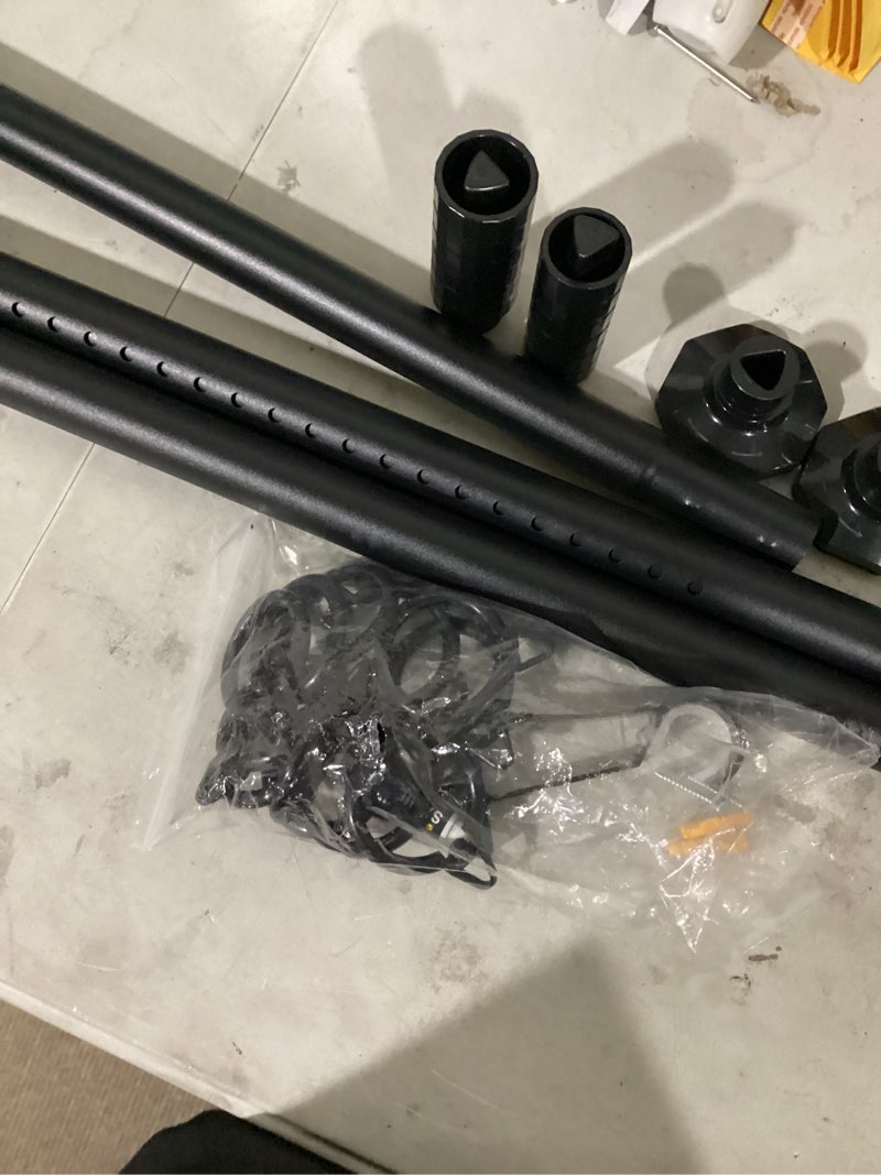 Condition photo showing As Is for metal curtain rod set layout, featuring telescoping poles, mounting brackets, and matching clip rings.