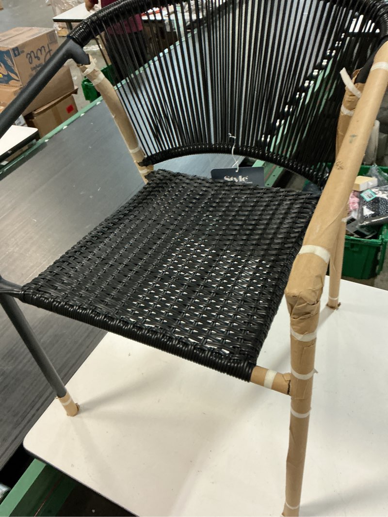 Condition photo showing As Is for  style selections pelham bay wicker stackable black steel frame stationary dining chair with
