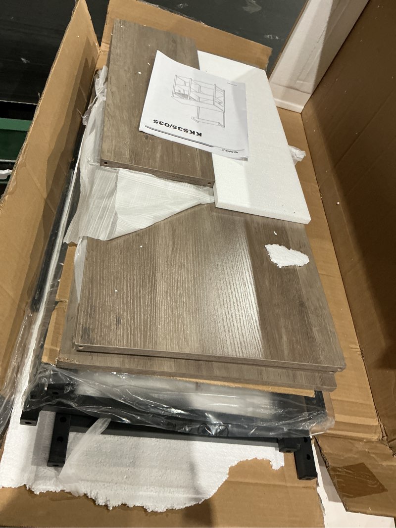 Condition photo showing As Is for vasagle baker's rack, microwave stand, kitchen storage rack with wire basket, 6 hooks, and shelves, for spices, pots, and pans, heather greige and ink black ukks035b02 heather greige + ink black no power outlet