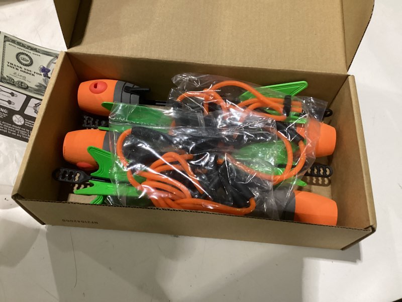 Condition photo showing As Is for zing z-curve bow bungee replacement and arrow refill pack - includes 2 orange z-curve bungee sets and 4 orange zonic whistling arrows | orange whistle & soft foam bounce-back tips, screaming sound, 2 easy-swap power cord sets, backyard & beach target play