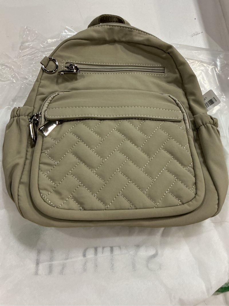 Condition photo showing New/Like New for mini backpack for women small backpack purse, anti theft backpack waterproof lightweight puffer back packs for travel, work with coin purse khaki