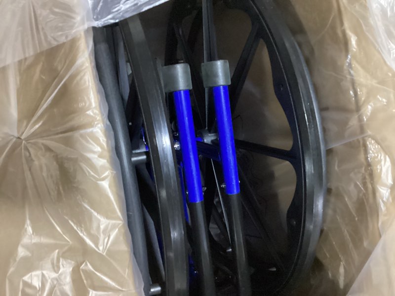 Condition photo showing As Is for medline lightweight foldable transport wheelchair with handbrakes and 12-inch wheels, blue frame, black upholstery