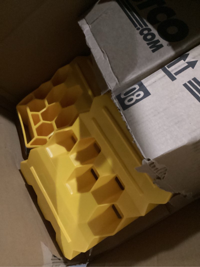 Condition photo showing Good Condition for camco curved camper/rv leveler & wheel chock - features heavy duty honeycomb design & includes non-slip rubber grippers on wheel chock - compatible w/trailers up to 30,000 lbs - 1-pack (44423) pack of 1