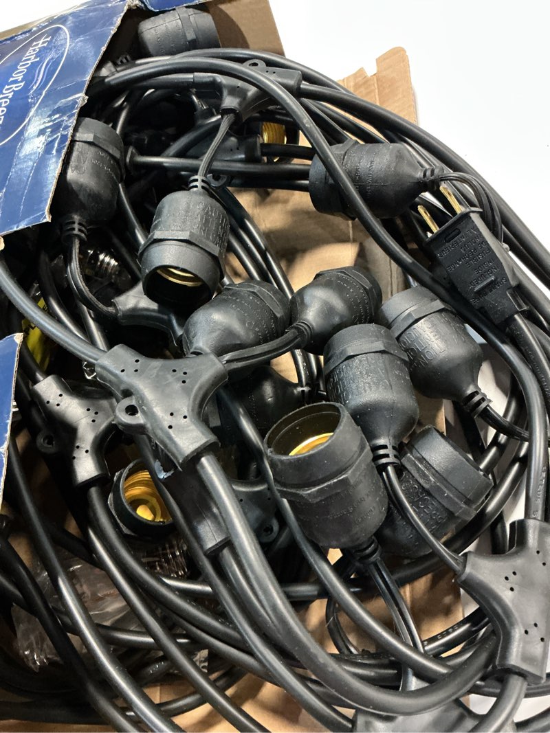 Condition photo showing As Is for harbor breeze 48-ft plug-in black indoor/outdoor string light with 24 white -light led edison bulbs