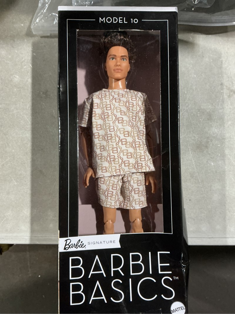 Condition photo showing Good Condition for barbie basics model collector ken fashion doll 10 with brunette hair in shirt & shorts with matching print, universal-fit fashions & posable body