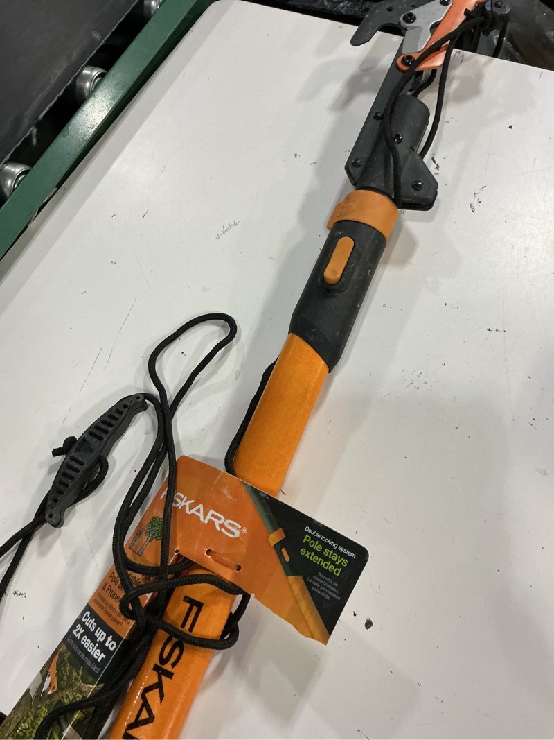 Condition photo showing As Is for powerlever 1-1/8 in. cut capacity steel saw blade 15 in. fiberglass pole 14 ft. tree pruner