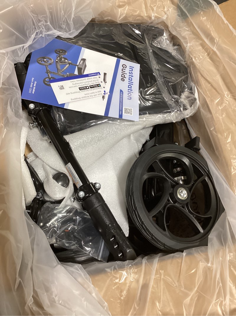 Condition photo showing New/Like New for steerable knee walker deluxe medical scooter for foot injuries compact crutches, with dual rear on-wheel brake and shock absorption under the knee pad, black