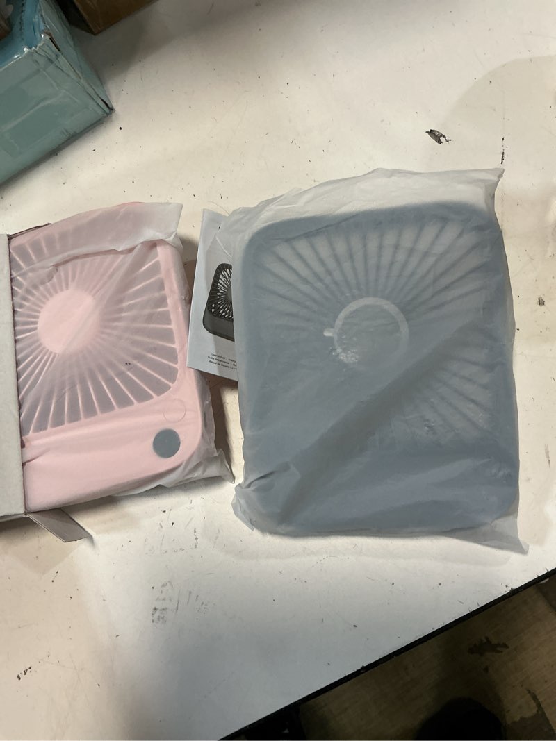 Condition photo showing Good Condition for topk 2 pack 5000mah portable desk fan, ultra-thin rechargeable battery operated fan with digital display, quiet 4-speed small personal travel fans for office, bedroom, cruise, outdoor black & pink