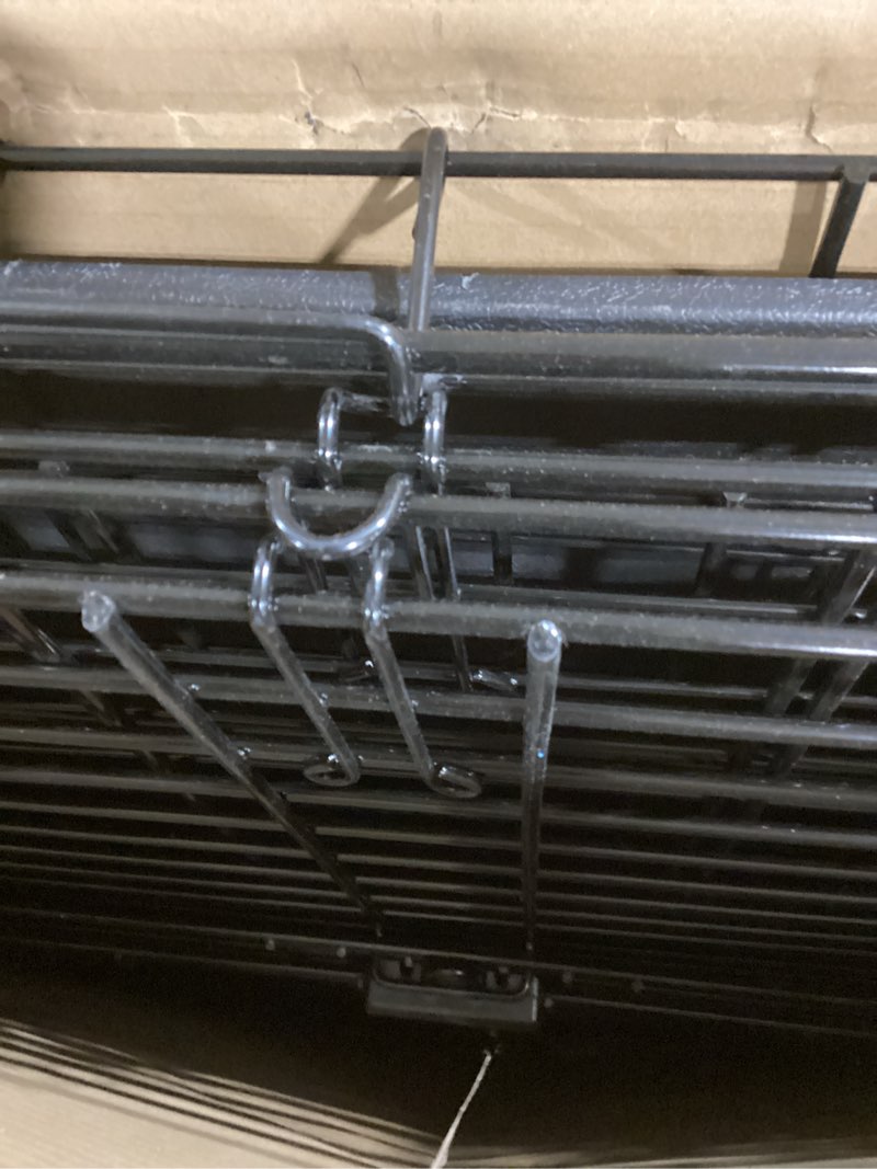 Condition photo showing Good Condition for Amazon Basics Durable, Foldable Metal Wire Dog Crate with Tray, Double Door, 48 x 30 x 32.5 in, Black 48.0"L x 30.0"W x 32.5"H Double Door w/ Divider