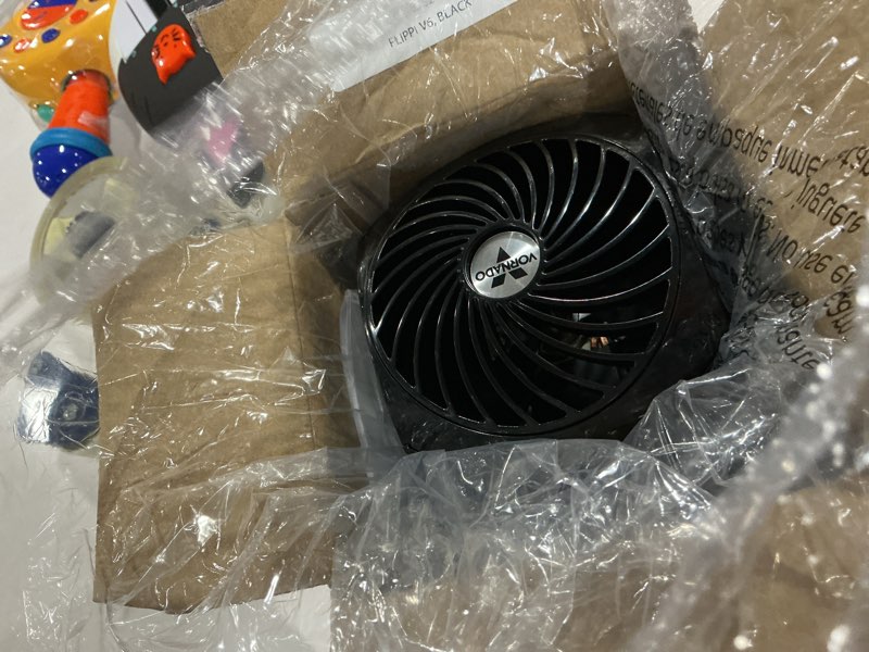 Condition photo showing As Is for vornado flippi v6 compact air circulator fan, adjustable head, 2 speeds, black