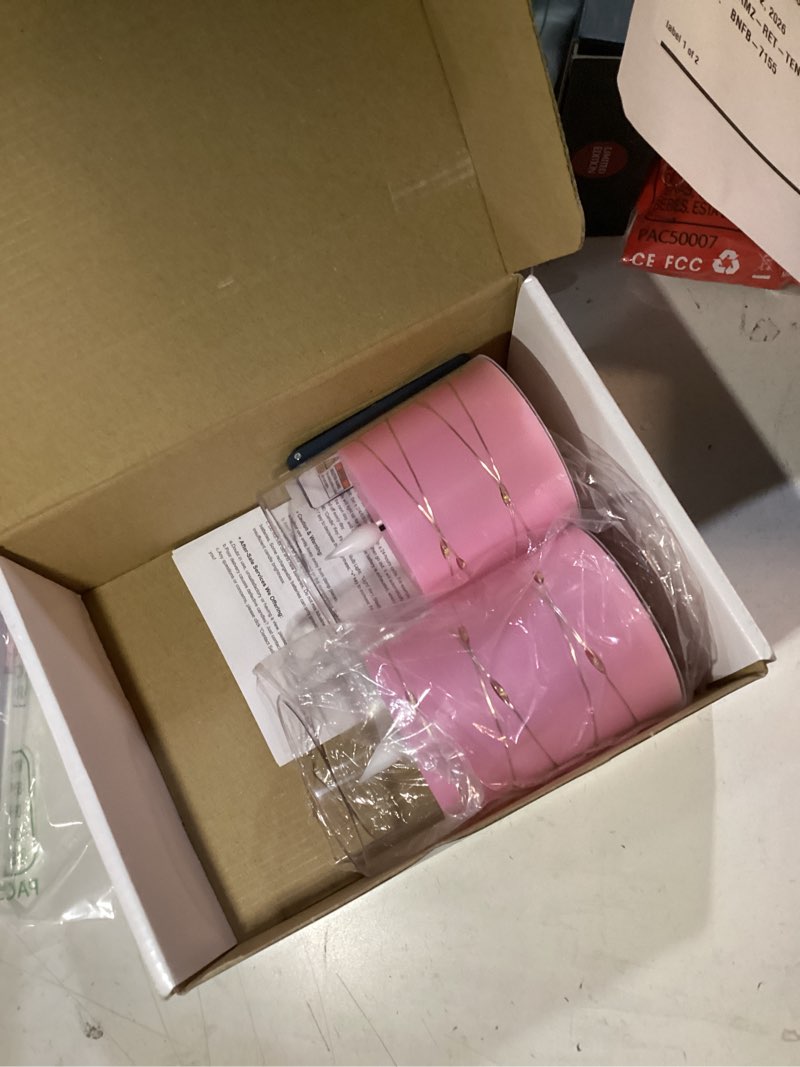 Condition photo showing item condition for Homemory Flickering Flameless Candles with String Lights, Battery Operated Candles, Embedded String Lights LED Candles, Unbreakable Plexiglass Candle with Remote, Set of 3, Pink
