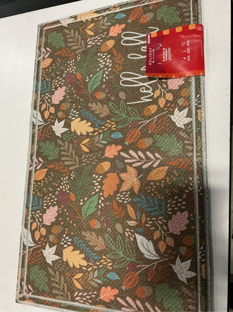 Condition photo showing As Is for holiday living 18-in x 30-in hello fall non-slip grip outdoor fall door mat
