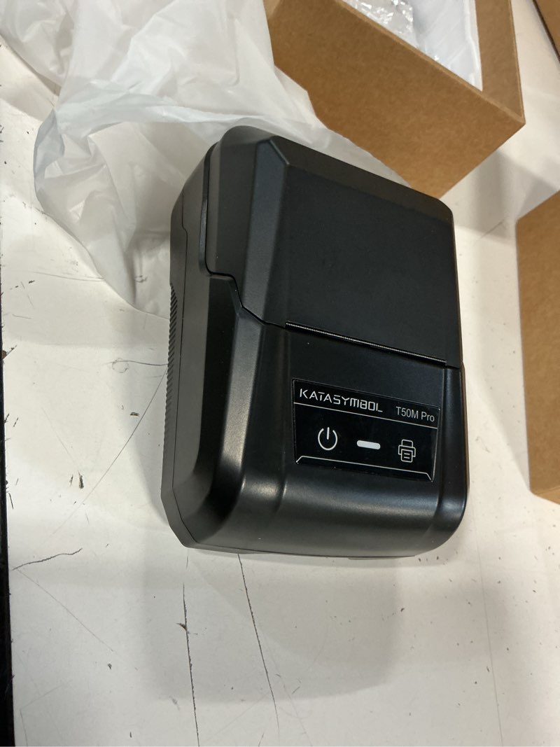 Condition photo showing As Is for supvan t50m pro bluetooth label maker machine with tape, wide waterproof label, versatile app with 30+ fonts and 660+ icons, inkless labeler for home, kitchen, school, office organization, black machine + 1 tape