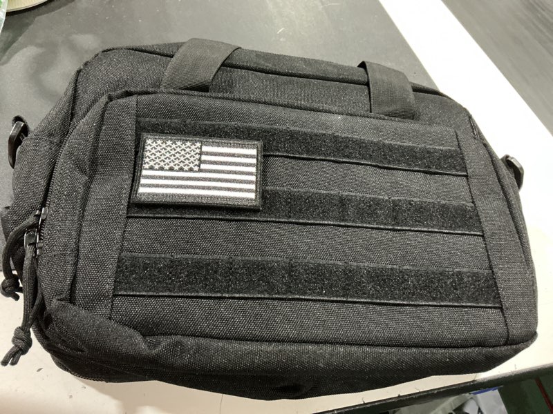 Condition photo showing Good Condition for tactical gun range bag, pistol carrying bag for 2 handguns and ammo, firearm shooting case with 6 magazine slots and lockable zipper for shooting range & outdoor hunting black comes with brand patch