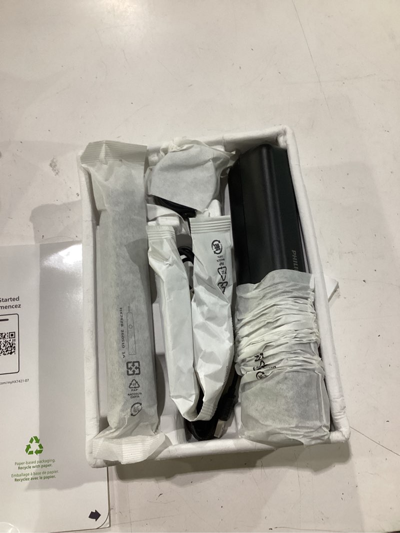 Condition photo showing New/Like New for philips sonicare 7300 series electric toothbrush - next-generation sonicare technology, pressure sensor, 12 brushing settings, smartimer, brushpacer, 21-day runtime, travel case, black, hx7421/07 deep black 1 count (pack of 1)