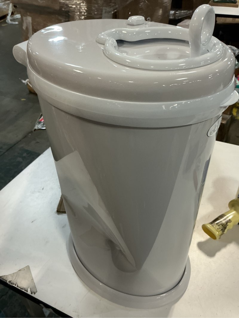 Condition photo showing As Is for Ubbi Stainless Steel Diaper Pail, Odor Locking, No Special Bag Required, Award-Winning, Registry Must-Have, Gray