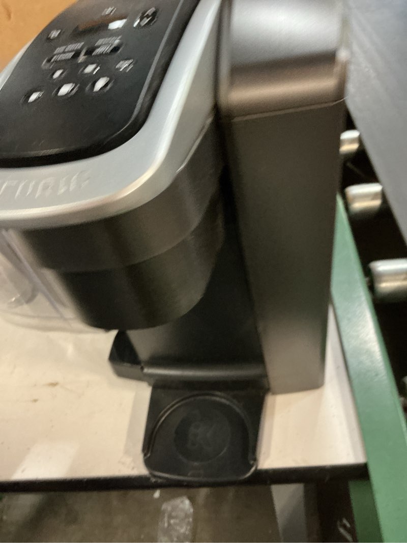 Condition photo showing As Is for keurig k-elite single serve k-cup pod coffee maker, with strength and temperature control, iced coffee capability, 8 to 12oz brew size, programmable, brushed slate