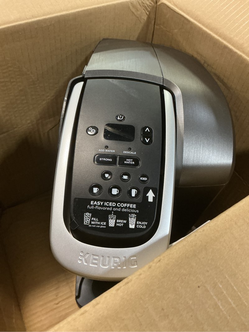 Condition photo showing As Is for Keurig K-Elite Single Serve K-Cup Pod Coffee Maker, with Strength and Temperature Control, Iced Coffee Capability, 8 to 12oz Brew Size, Programmable, Brushed Slate