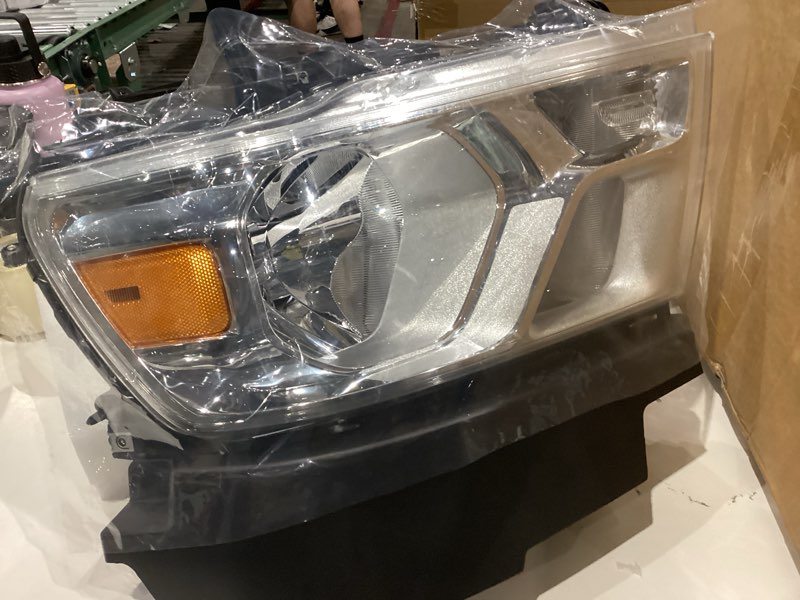 Condition photo showing New/Like New for passenger side headlight, unknown maker car