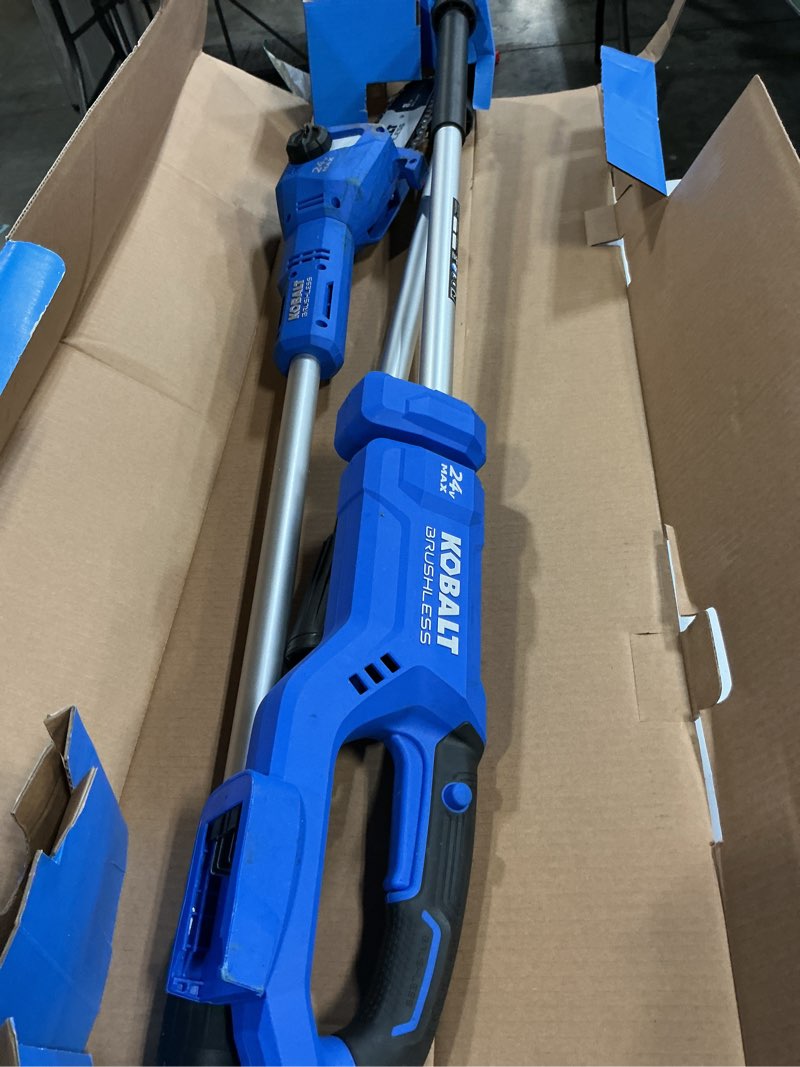 Condition photo showing As Is for kobalt 24-volt 8-in 2 ah pole saw (battery and charger included)