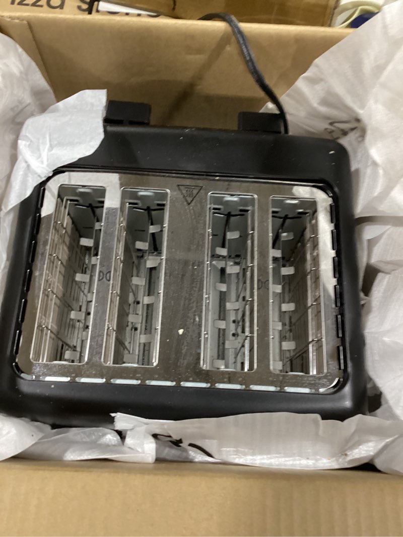 Condition photo showing New/Like New for Amazon Basics 4 Slice Toaster, With 7 Browning Settings, Extra Wide Slots For Bagels and Special Breads, Removable Easy-to-Clean Crumb Trays, Cancel/Defrost/Bagel Buttons, 1500W, Black & Silver 4 Slice Matte Black Front