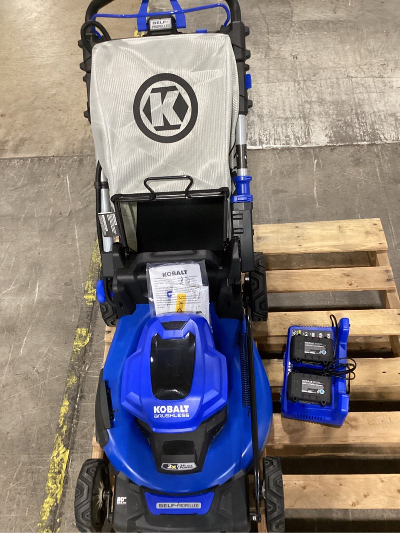 Condition photo showing As Is for kobalt 24-volt, 20-in self propelled battery walk mower with battery and charger