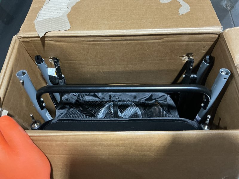 Condition photo showing As Is for baby trend snap n go ex polyester lightweight foldable universal single infant car seat carrier with 2 cup holder and covered compartment, black single stroller