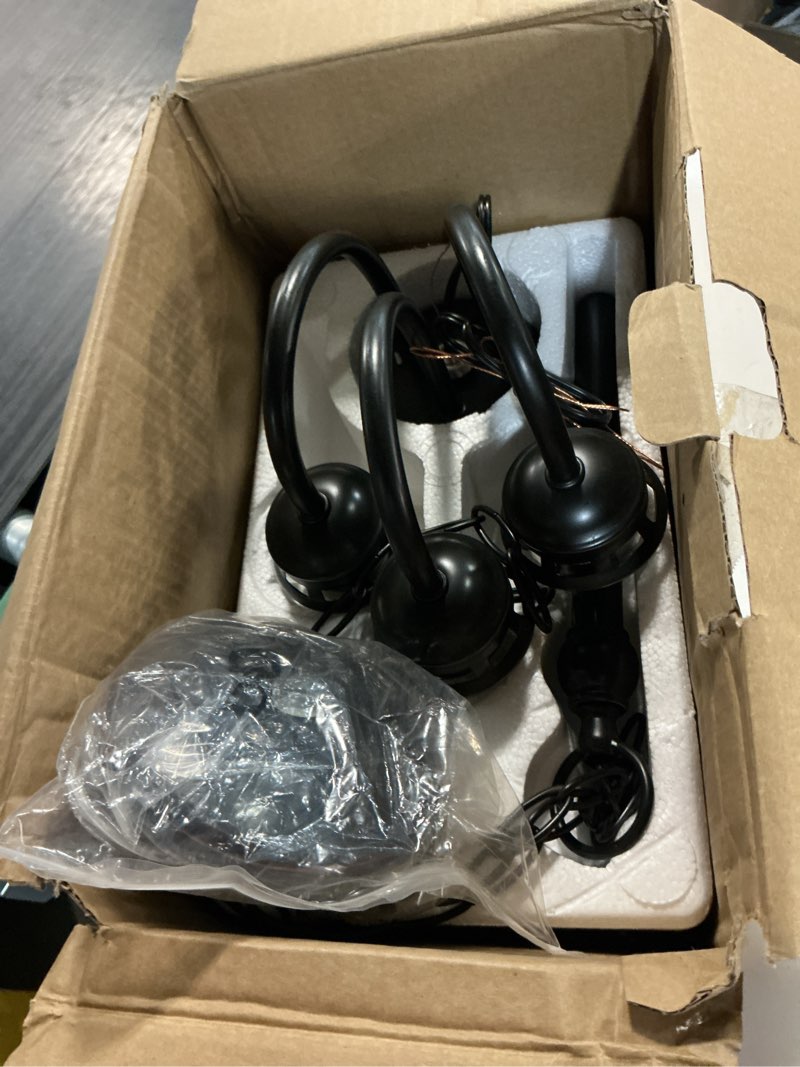 Condition photo showing As Is for  project source fallsbrook 3 -light matte black clear glass steel chandelier