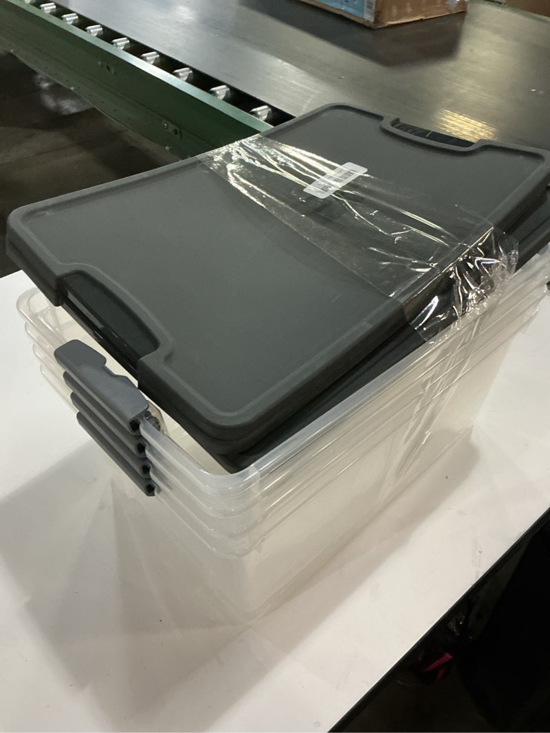 Condition photo showing Good Condition for HOMZ 4-Pack Secure Latch, Clear Plastic Storage Organizer Bins, 15 Quart, Gray Lid - Stackable Container Boxes for Bedroom, Bathroom, Garage, and Office Organization Gray Lid 15 QT