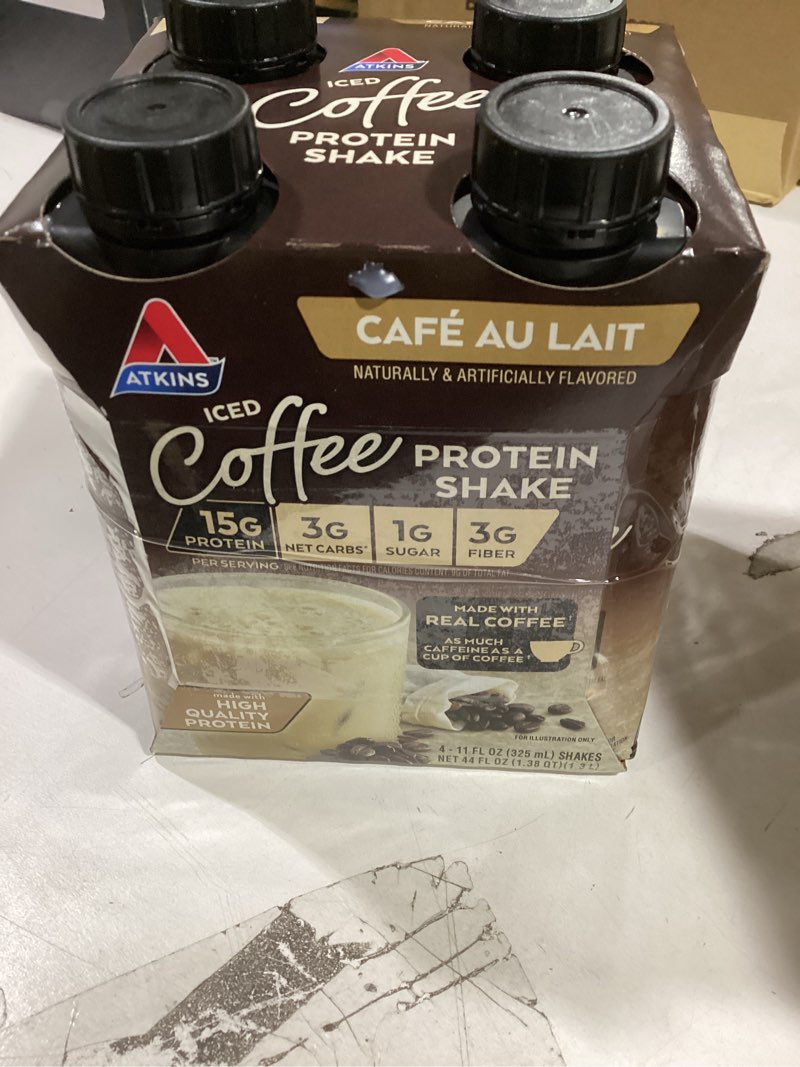 Condition photo showing New/Like New for Atkins Café au Lait Iced Coffee Flavored Protein Shake, High Protein Shake, Low Sugar, Low Carb and Low Sugar, Keto Friendly, Gluten Free, 12 Count Café Au Lait 1 Fl Oz (Pack of 1)