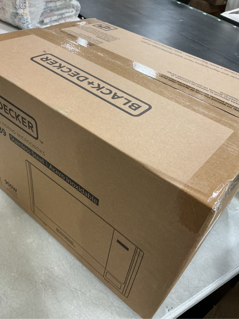 Condition photo showing New/Like New for black+decker digital microwave oven with turntable push-button door, child safety lock, stainless steel, 0.9 cu ft 0.9 cu.ft