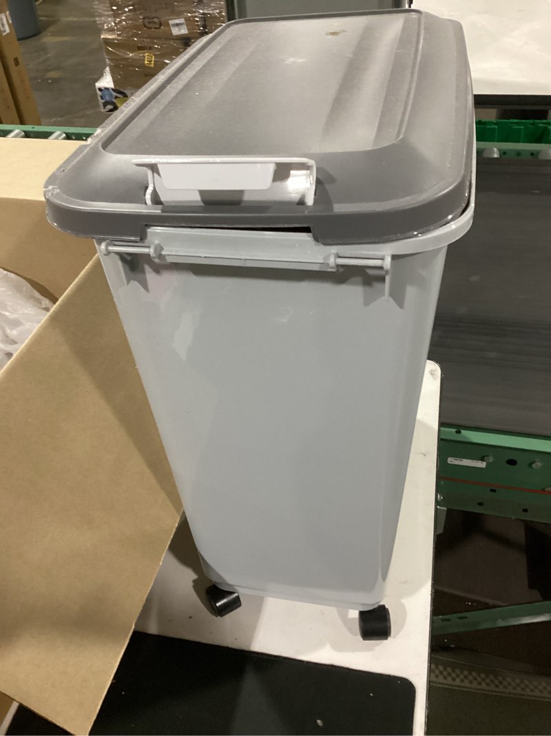 Condition photo showing As Is for iris usa dog food storage container with wheels, airtight lid, 2-cup scoop, up to 40 pounds pet food storage, built in scoop storage in lid, versatile pet food bin, portable, bpa free, gray/dark gray 40 lbs dark gray