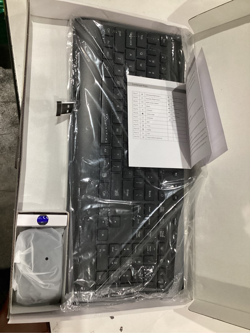 Condition photo showing As Is for trueque km31 wireless keyboard and mouse combo - full-size quiet typing with palm rest, phone holder, multimedia keys, power switch, batteries included, compatible with windows, chrome os, pc, laptop black