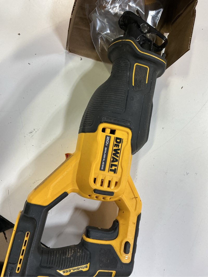 Condition photo showing As Is for dewalt 20v max cordless brushless reciprocating saw tool only
