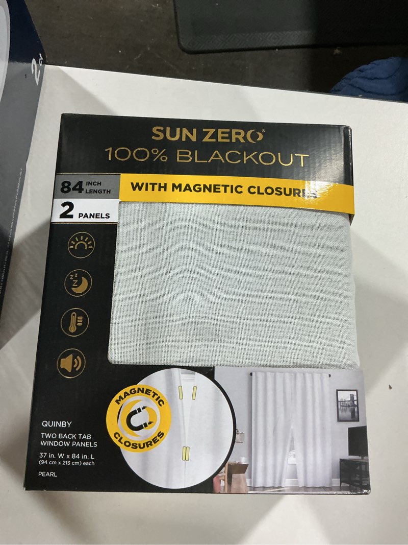 Condition photo showing Good Condition for sun zero 84-inches pearl blackout standard lined back tab curtain panel pair