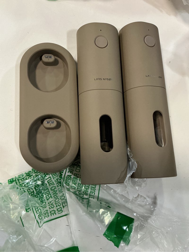 Condition photo showing Good Condition for lars nysøm electric salt and pepper grinder set, usb rechargeable, automatic salt and pepper mills, spice shakers refillable with led light, adjustable coarseness, ceramic grinder (taupe brown) set of two electric mills taupe brown