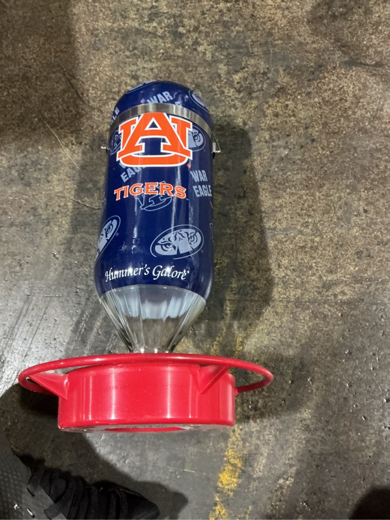 Condition photo showing New/Like New for Hummer's Galore, NCAA College Football Hummingbird Feeder, Glass Hummingbird Feeder with UV Resistant Plastic Wrap for Outdoors Hanging, 32 oz, (Auburn Tigers)