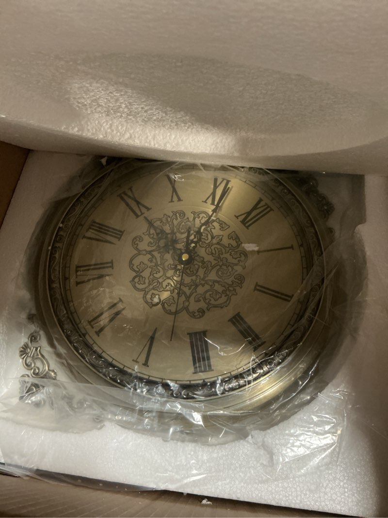 Condition photo showing Good Condition for Large Vintage Double Sided Wall Clock with Glass & Metal, Roman and Arabic Numerals, Silent Non-Ticking Battery Operated Antique Clock for Living Room, Office, Hallway Decor (15x18.5 Inch) Double Sided - ? 15 Inch Double Sided Wall Clock