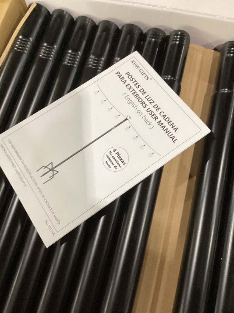 Condition photo showing New/Like New for Ottsuls 4 Pack 1.37 Ft Freestanding Outdoor Suspension String Light Poles with Fixing Clamp, Holder, and Light Post Mounting Stand, for Patio Fence Wall Garden Deck Bistro Backyard