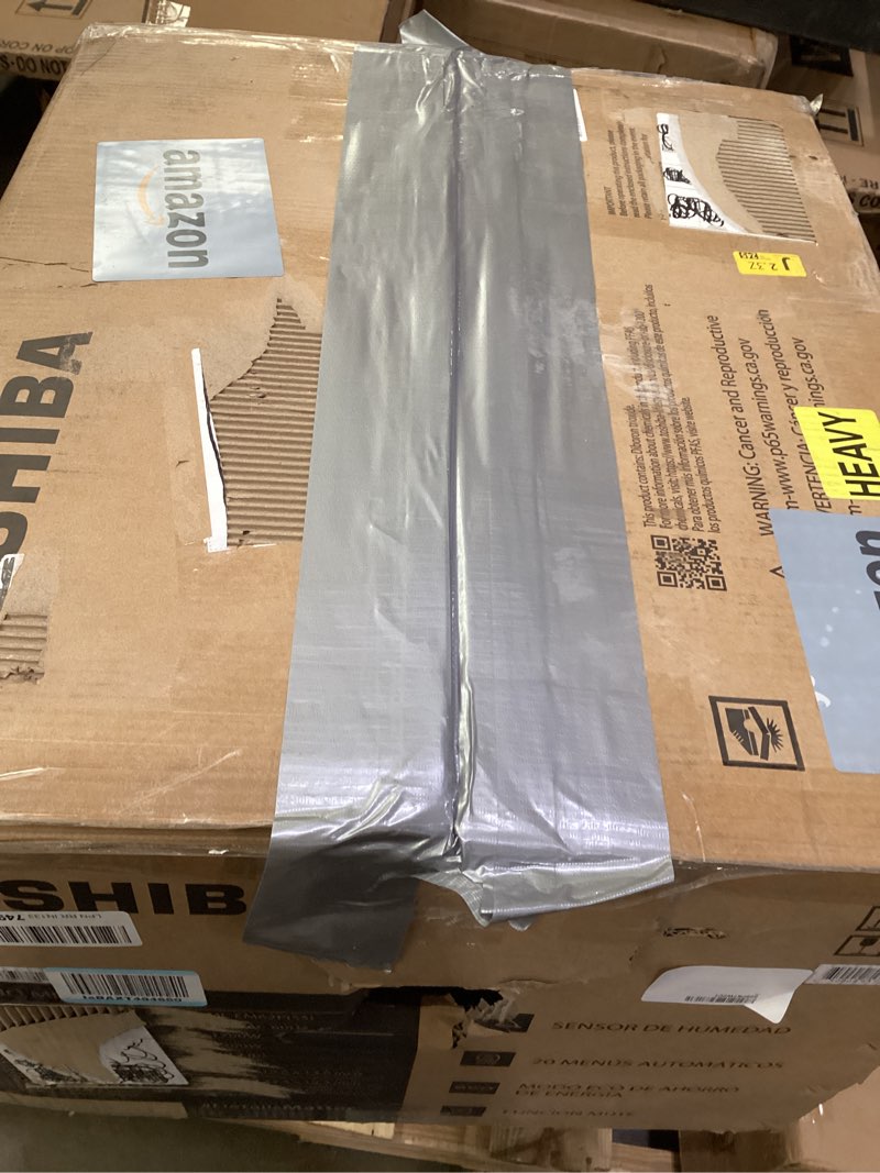 Condition photo showing As Is for toshiba ml-em62p(ss) large countertop microwave with smart sensor, 6 menus, auto defrost, eco mode, mute option & 16.5" position memory turntable, 2.2 cu ft, 1200w, stainless steel sensor-2.2 cu ft-1200w-stainless steel
