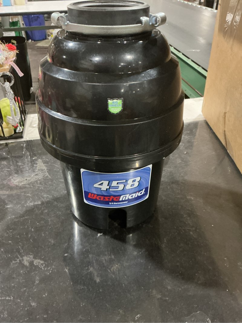 Condition photo showing As Is for waste maid 10-us-wm-458-3b garbage disposal anti-jam stainless steel food waste grinding system, 3/4 hp deluxe, black 3/4 hp deluxe grinding system