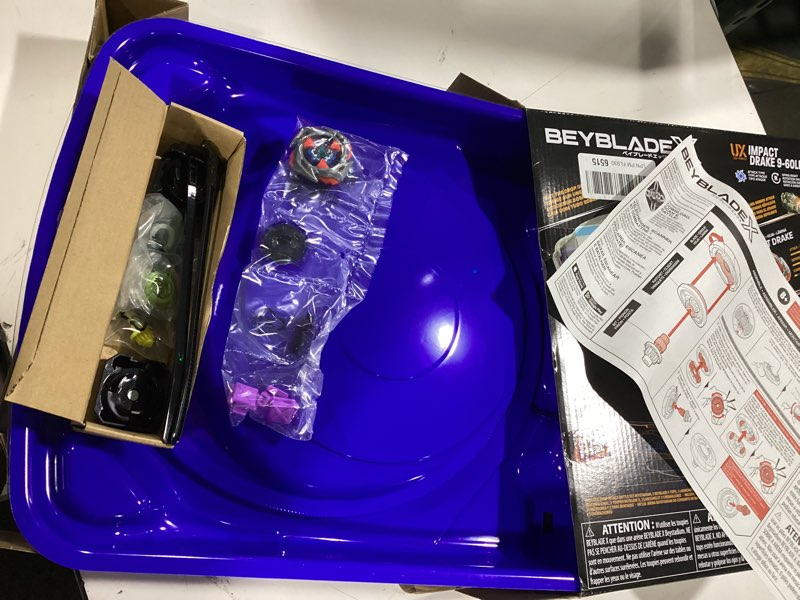 Condition photo showing As Is for beyblade x drop attack battle set with beystadium arena, 2 takara tomy tops & launchers, impact drake 9-60lr & hover wyvern 3-85n, battling game toys, ages 8+