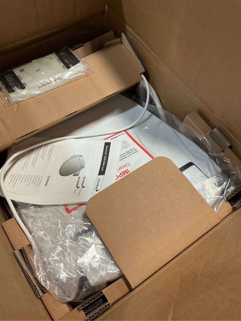Condition photo showing New/Like New for smartbidet® sb-2400 advanced electric smart bidet™ slim profile seat in round white with remote control, led night light, stainless steel nozzle, heated seat, warm dryer round whisper operation