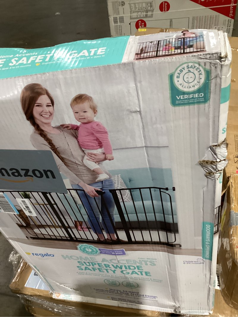 Condition photo showing As Is for regalo safety 30.5-58" extra wide arch baby gate with door, pressure mount walk through gate for doorways & bottom of stairs, babies, toddlers & pets, tested & safe, american designed, american owned black - 30.5-58"w x 30"h