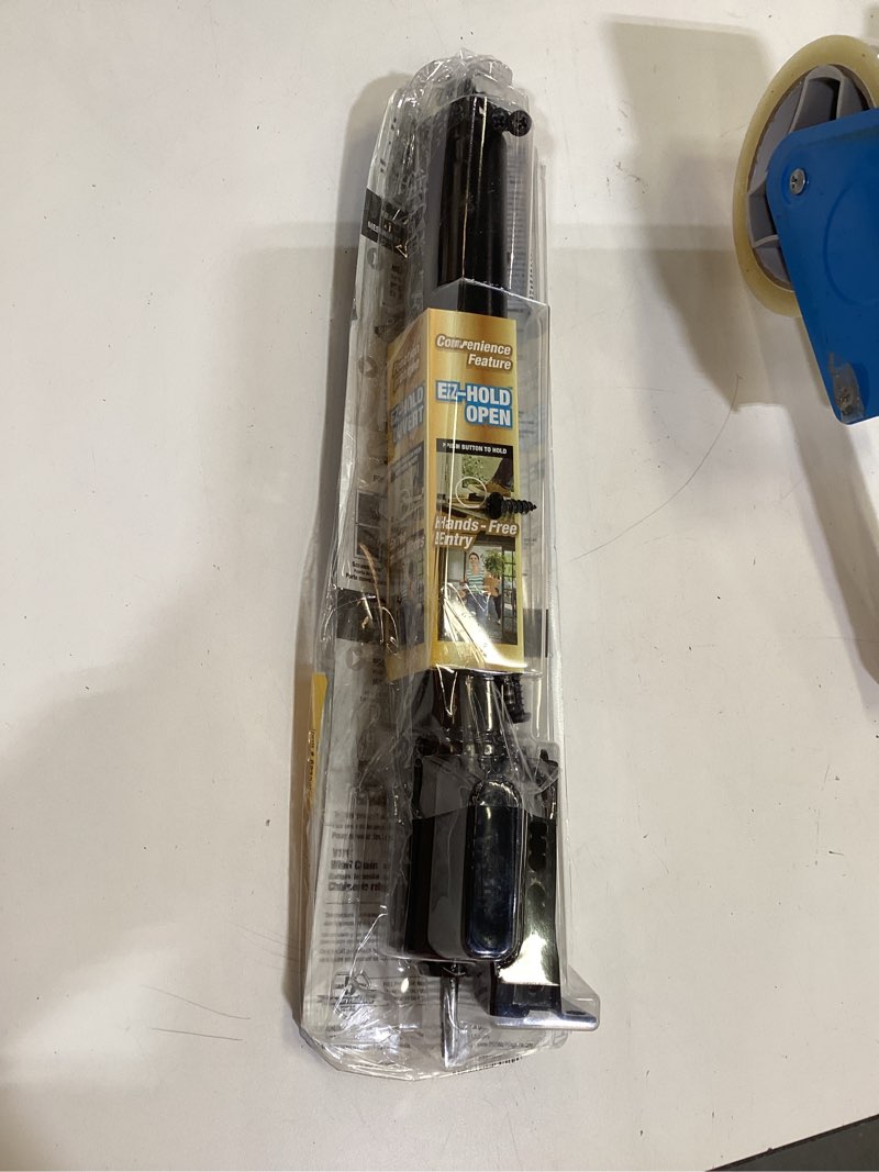 Condition photo showing As Is for ez hold closer, standard duty black
